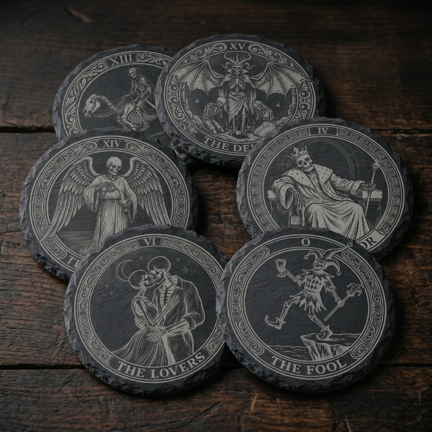 The Arcanum slate coasters arranged with the steel cocktail picks of varying lengths